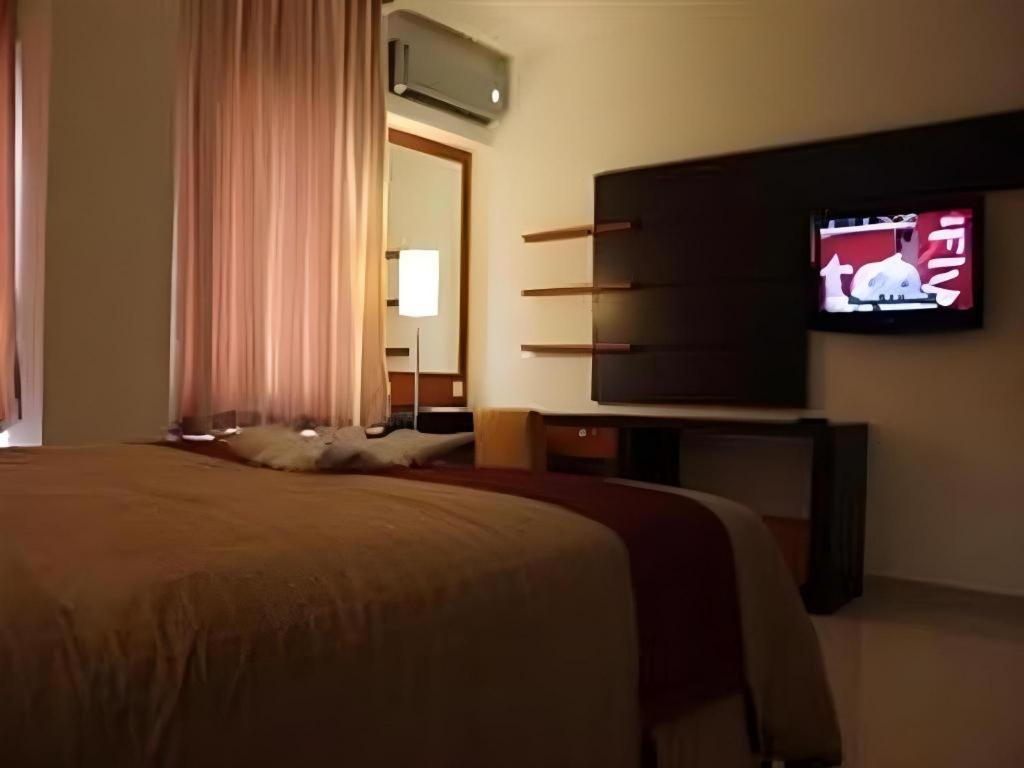 Travello Hotel Манадо Экстерьер фото