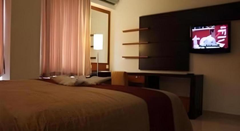 Travello Hotel Манадо Экстерьер фото