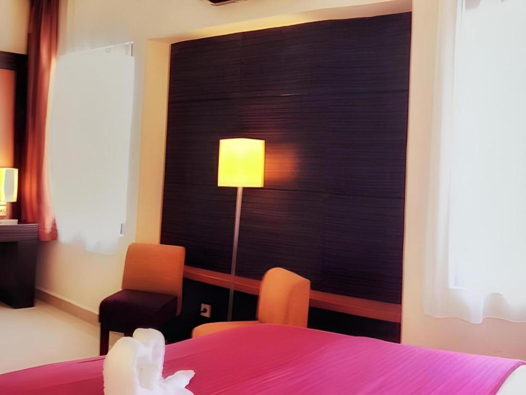 Travello Hotel Манадо Экстерьер фото